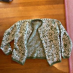 Green and white sweater